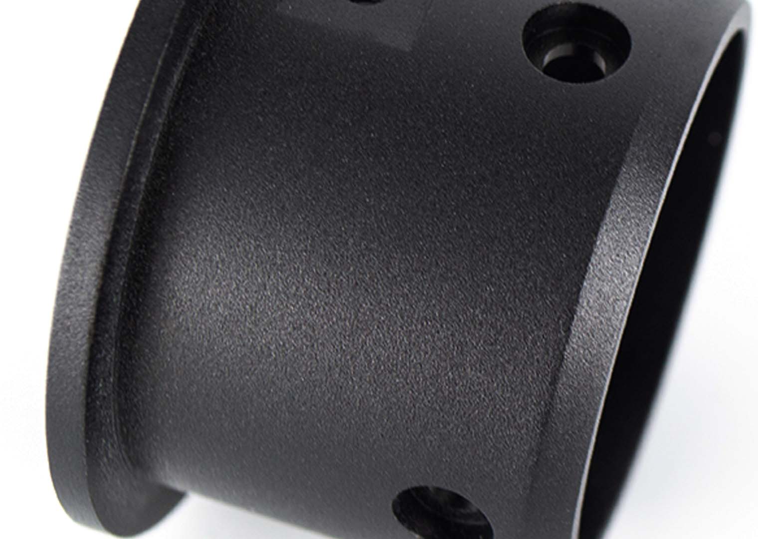 CNC machined aluminium workpiece with black oxide surface finish