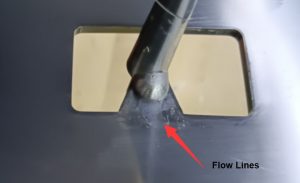 Flow line or flow mark defect in injection molding