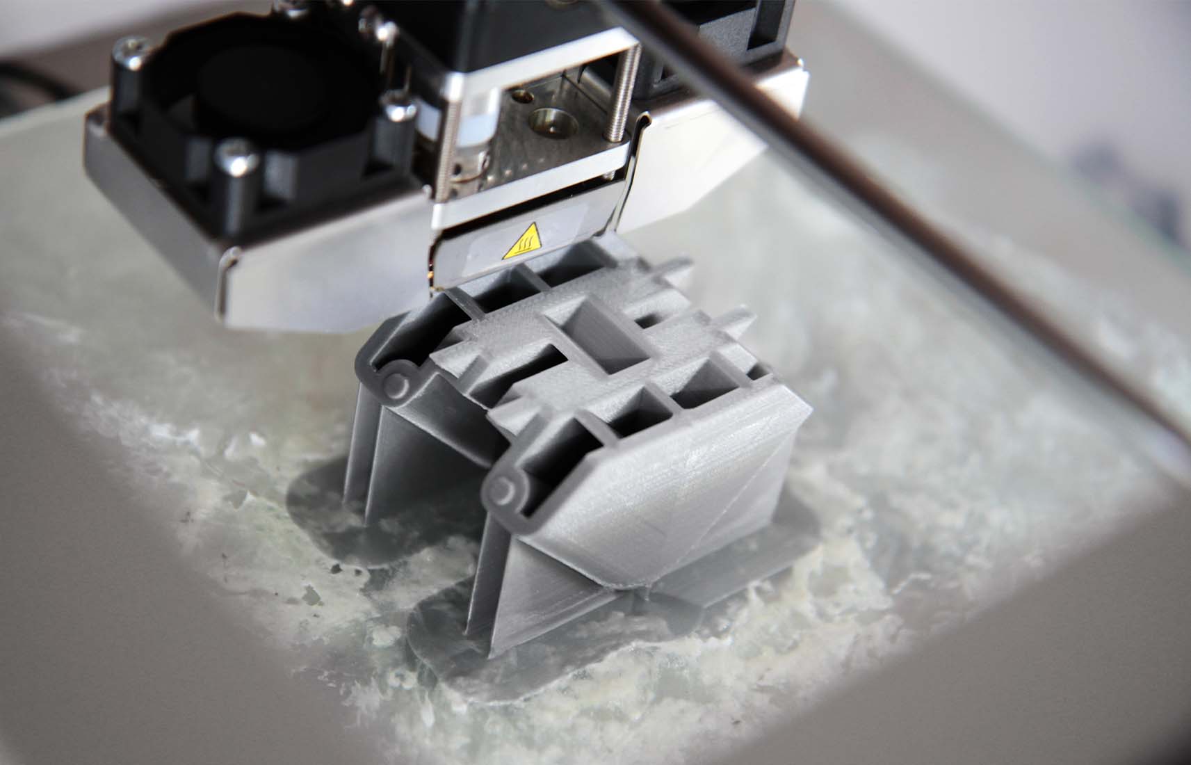 What is the difference between 3D printing and rapid prototyping?