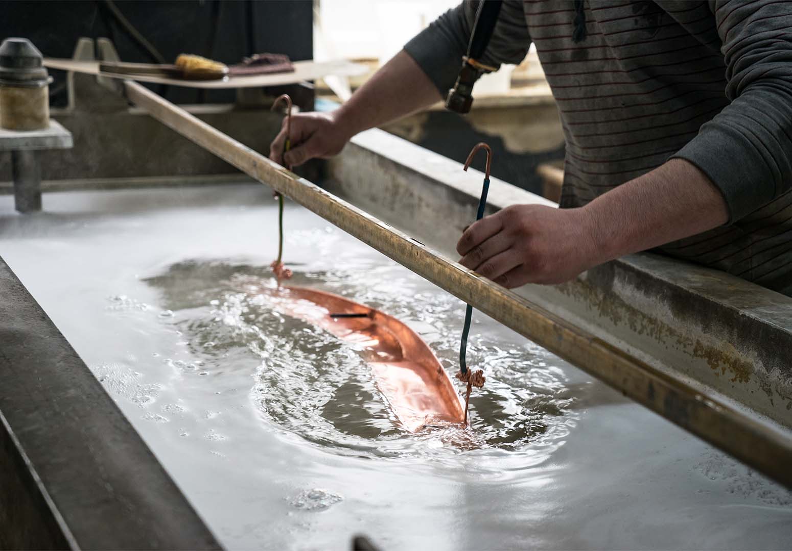 How an electroplated surface finish is applied to metal and plastic parts