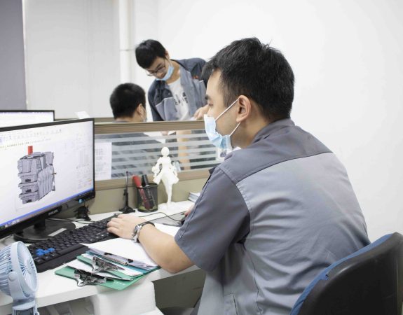 HLH Rapid engineer reviewing CAD drawing