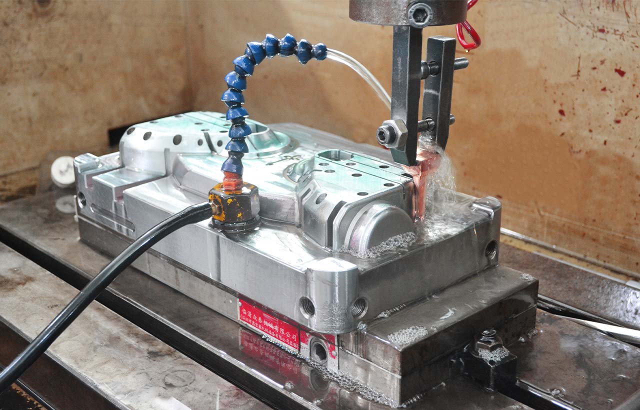 Machining bridge tooling for plastic injection moulding